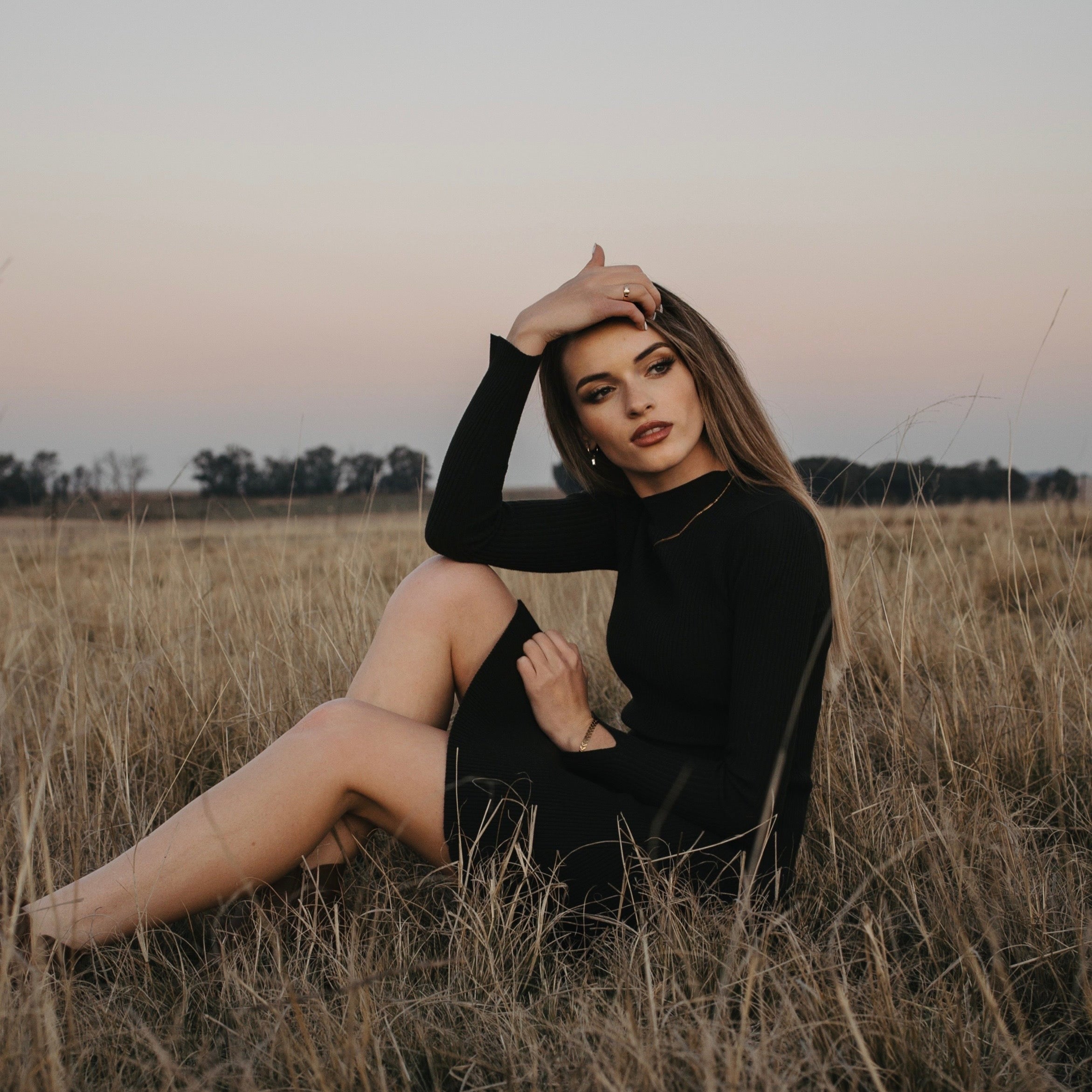 a picture of Vasti spiller wearing Sweet Willow jewellery.