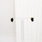 Gold earring studs with black centre shaped like a eye