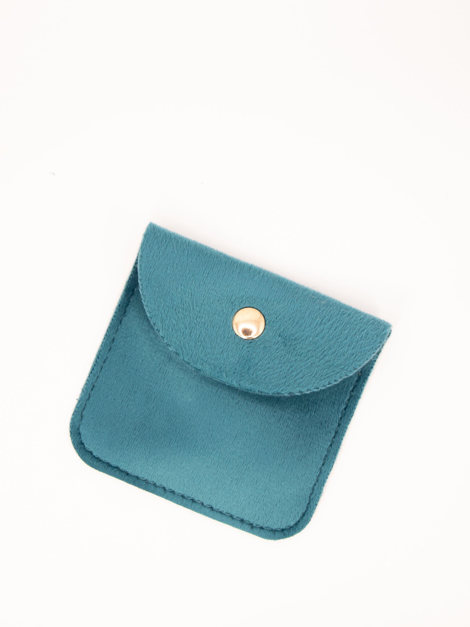 Teal pouch with a gold button on a white background
